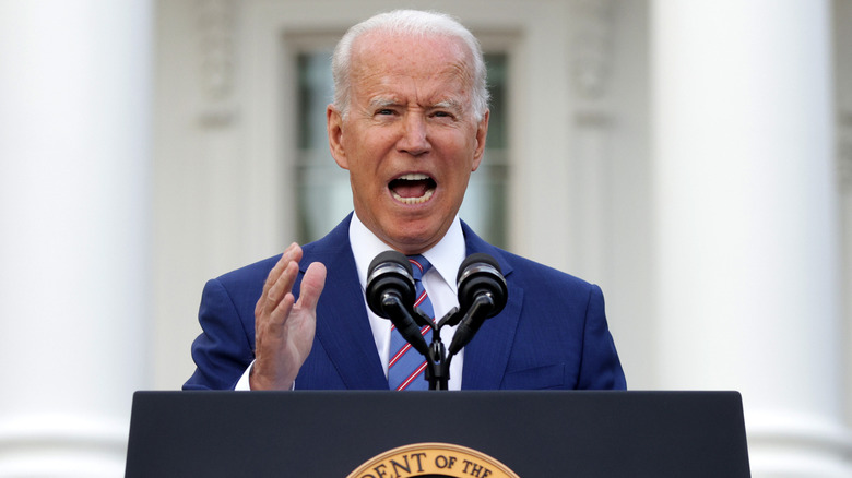 Joe Biden speaking at lectern