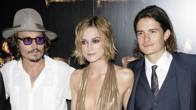 Johnny Depp, Keira Knightly, and Orlando Bloom posing together