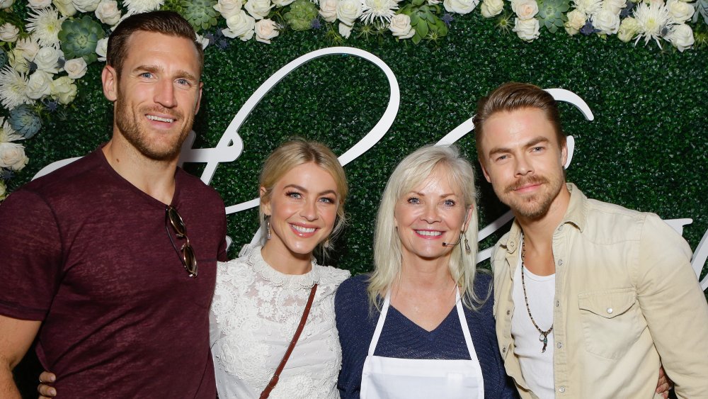 Brooks Laich, Julianne Hough, Marriann Nelson and Derek Hough attend the Paint & Sip & Help event to Benefit Children's Hospital Los Angeles
