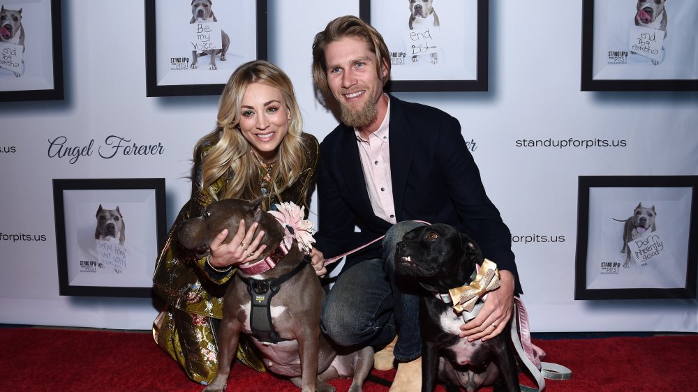 Kaley Cuoco and Karl Cook on the red carpet with pitbulls