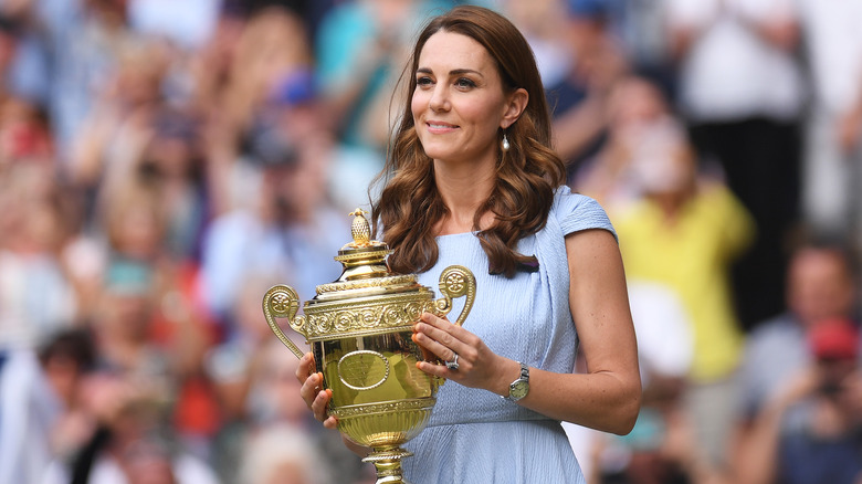 Kate Middleton holding a trophy