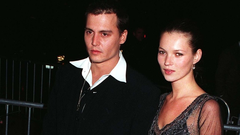 Johnny Depp and Kate Moss smizing