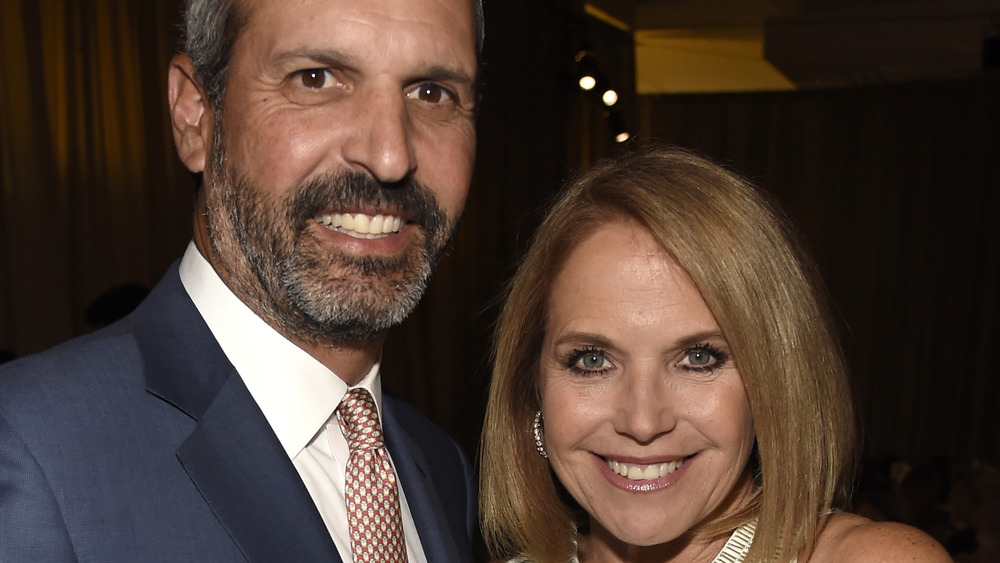 Katie Couric and John Molner dressed up and smiling
