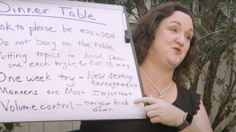 Katie Porter with her family's dining room rules