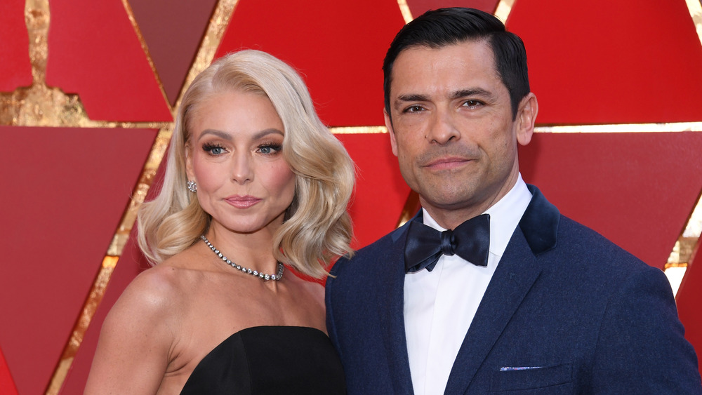 Kelly Ripa and Mark Consuelos at a black tie event