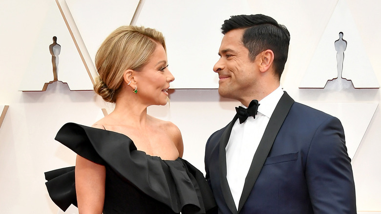 Mark Consuelos, Kelly Ripa looking at each other