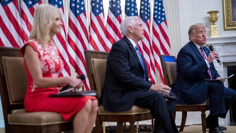 Kellyanne Conway with Mike Pence and Donald Trump