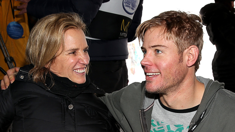 Kerry Kennedy and Trevor Donovan embracing 