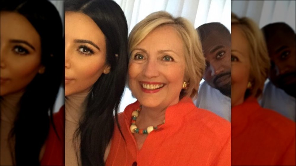 Kim Kardashian in a selfie with Hillary Clinton and Kanye West