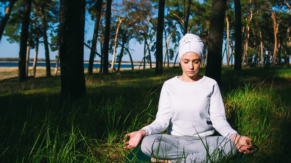 Kundalini yogi in a forest