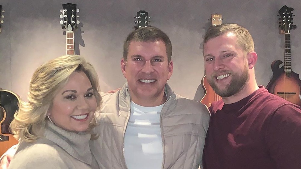 Kyle Chrisley with his father, Todd and stepmother Julie