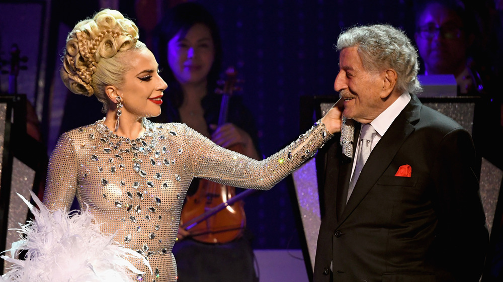 Lady Gaga caresses Tony Bennett onstage 