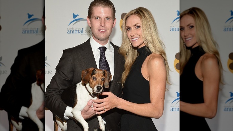 Lara and Eric Trump with dog