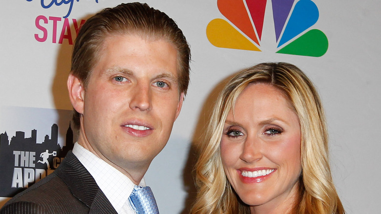 Eric Trump and Lara Trump posing