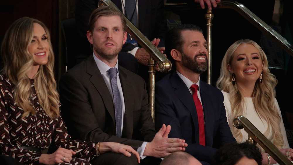 Lara Trump, Eric Trump, Donald Trump Jr., and Tiffany Trump sitting at event