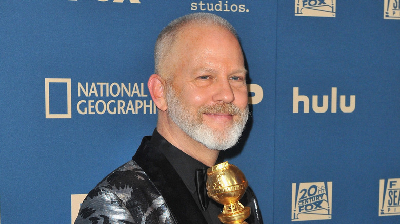 Ryan Murphy with an award