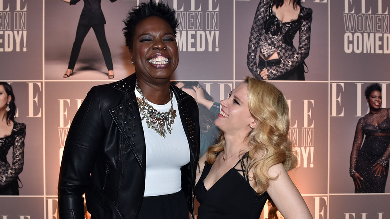 Leslie Jones and Kate McKinnon smiling big