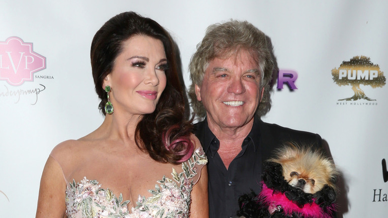 Lisa Vanderpump and Ken Todd smiling for photos