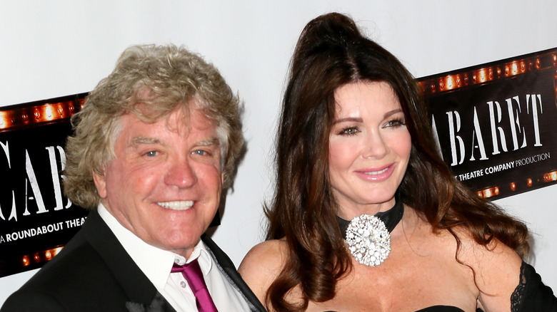 Ken Todd and Lisa Vanderpump posing on the red carpet