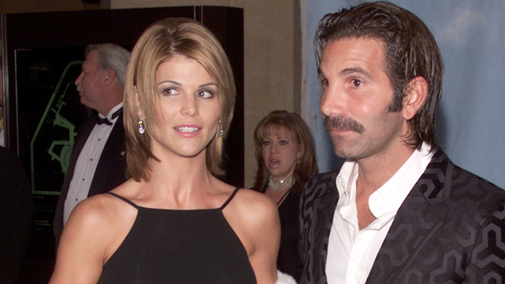 Lori Loughlin and Mossimo Giannulli at a black tie event