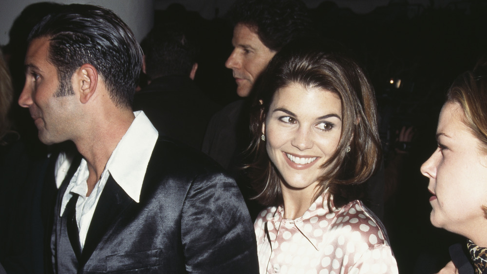 Lori Loughlin and Mossimo Giannulli at a gathering