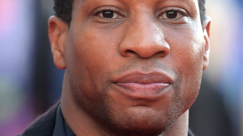 Jonathan Majors smiling 