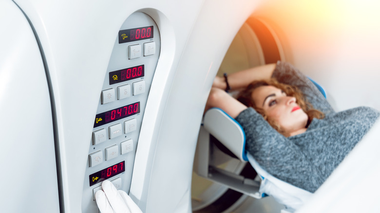 Woman going through MRI machine