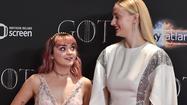 Maisie Williams and Sophie Turner posing 