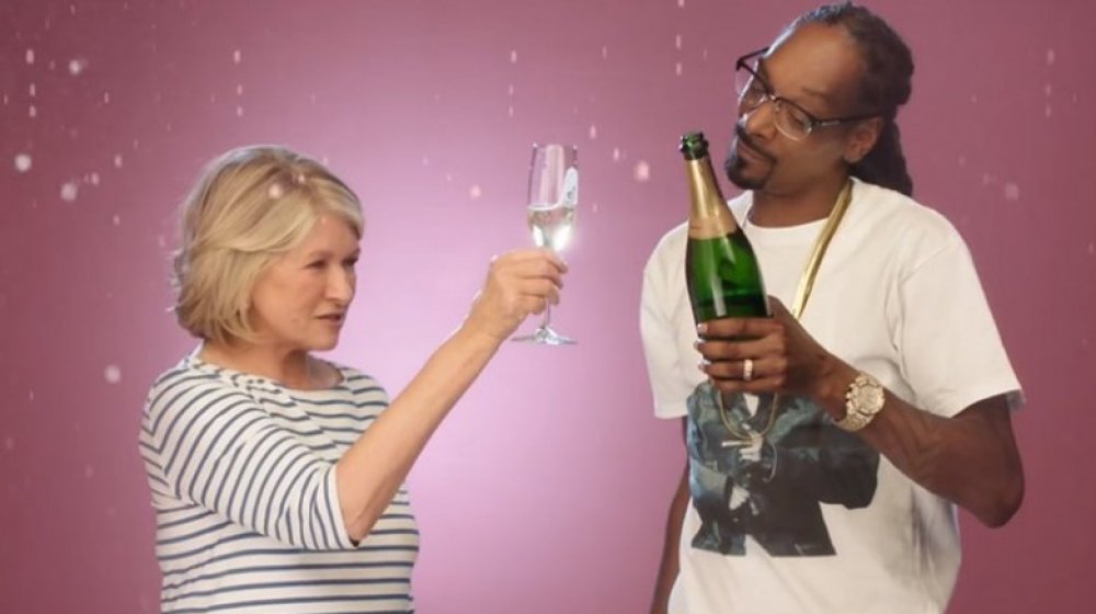 Martha Stewart, Snoop Dogg holding champagne