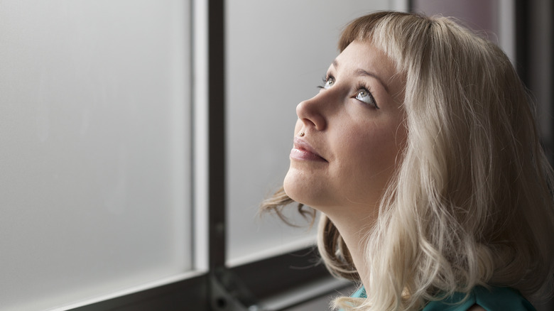 Woman with medusa piercing