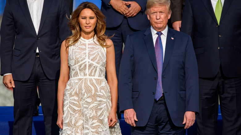 Donald and Melania Trump standing together