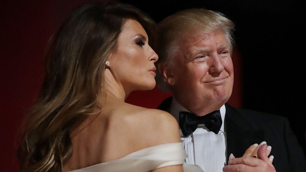 Donald Trump and Melania Trump in formal attire dancing