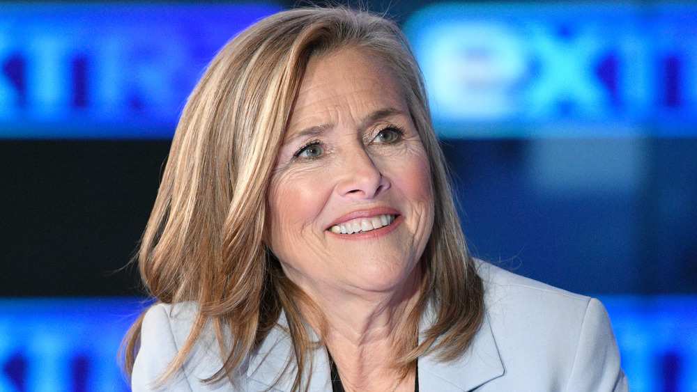 Meredith Vieira in front of exit signs