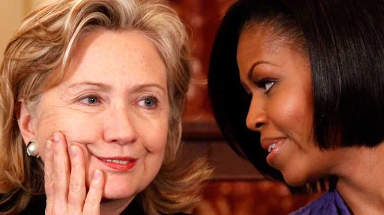 Hillary Clinton and Michelle Obama talking