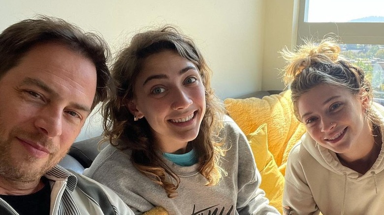 David Case takes a selfie with his two daughters