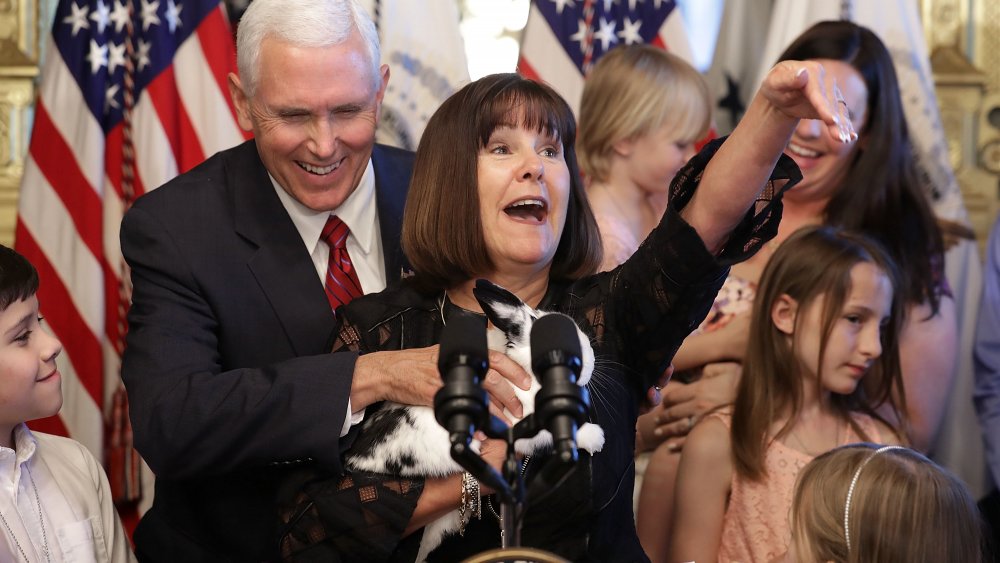 Karen Pence holds Marlon Bundo and cheers 