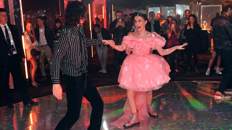 Millie Bobby Brown and Finn Wolfhard  dancing