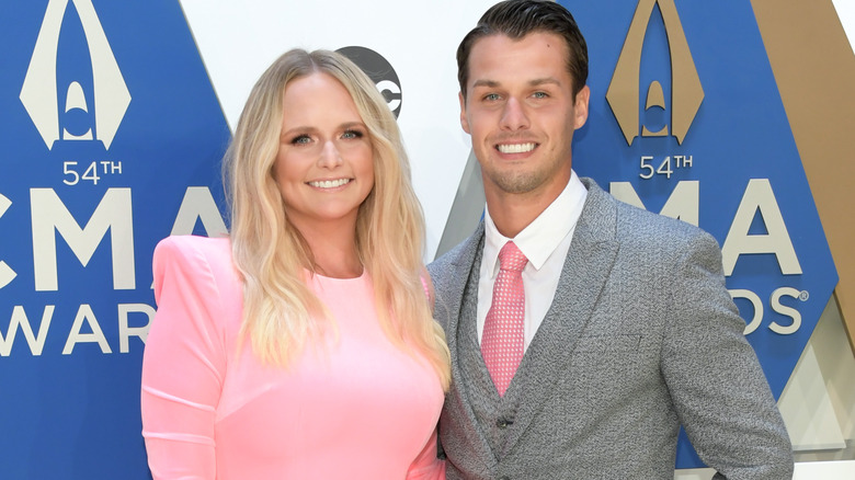 Miranda Lambert and Brendan McLoughlin wearing pink