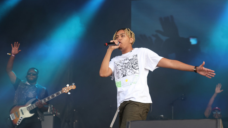 Cordae performing onstage