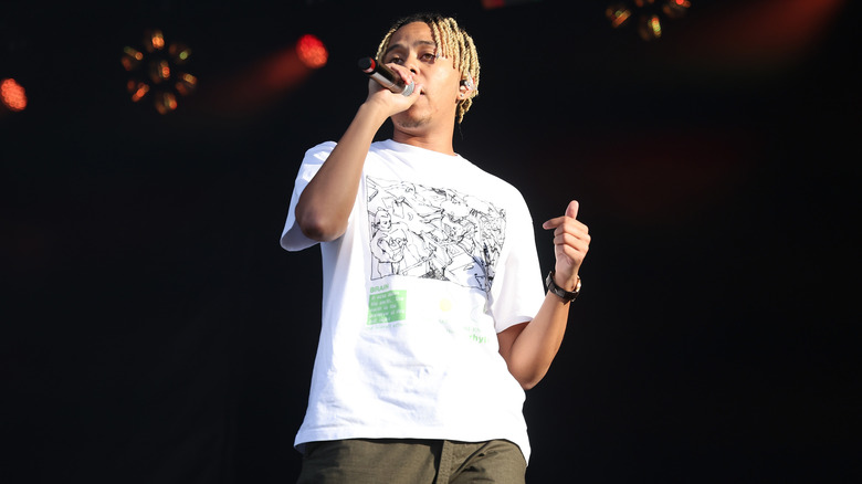 Cordae performing onstage