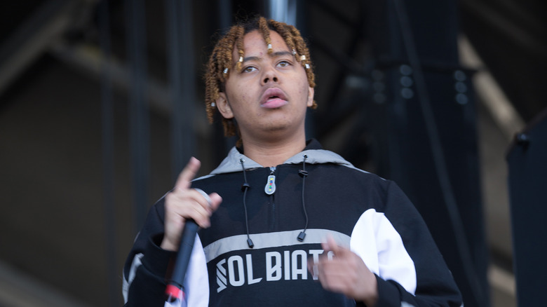 Cordae speaking outdoors