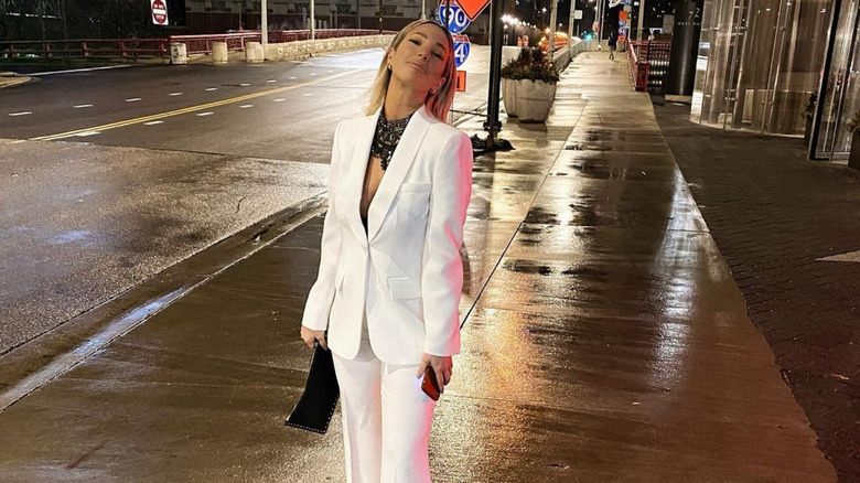 Shaina Hurley posing in a white suit