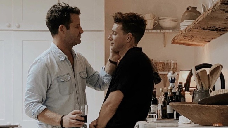 Nate Berkus touching Jeremiah Brent's cheek