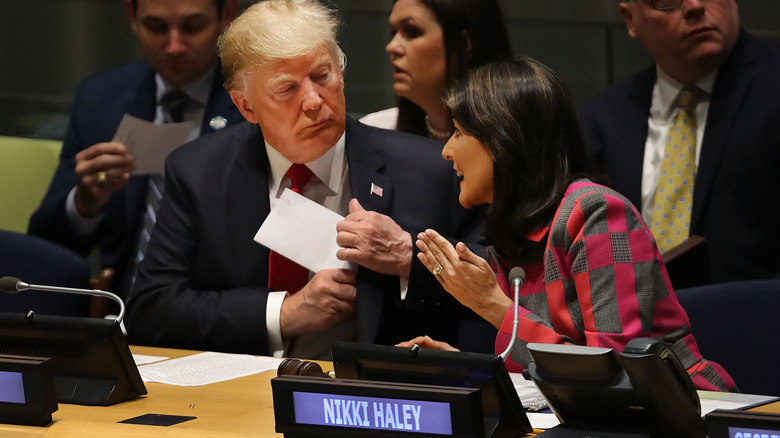 Nikki Haley speaking with Donald Trump