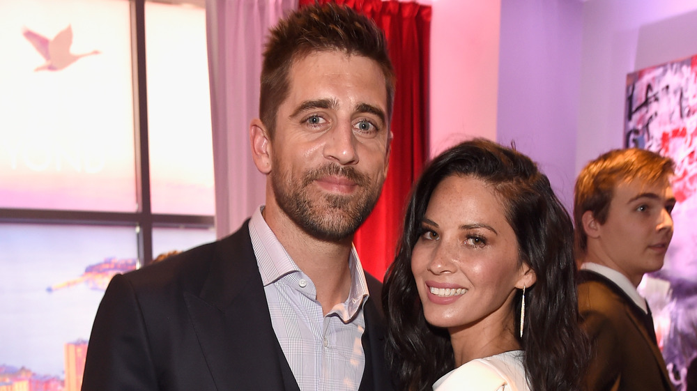 Olivia Munn and Aaron Rodgers attend an event
