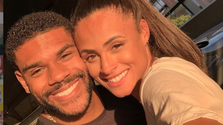 Sydney McLaughlin smiles with Andrew Levrone Jr. in a selfie.