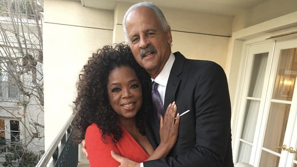 Oprah, Stedman on a balcony