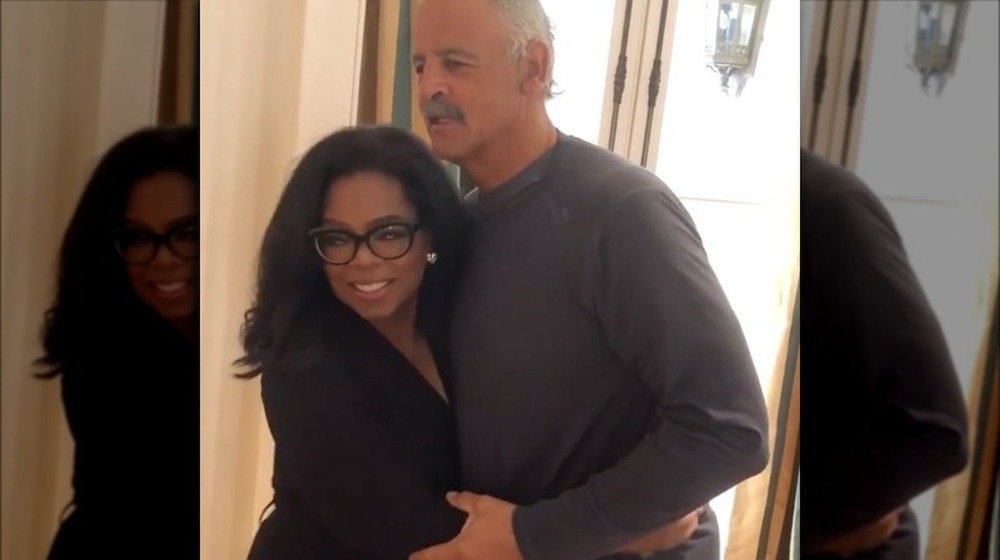 Oprah Winfrey, Stedman Graham hugging