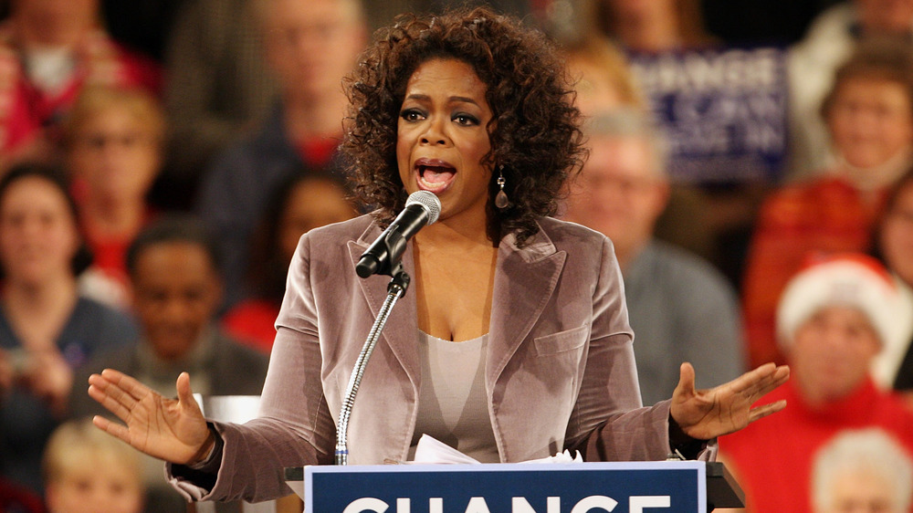 Oprah speaking at a political rally