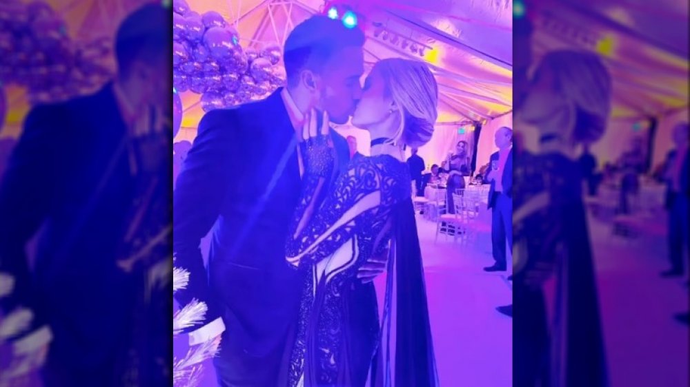 Paris Hilton and Carter Reum smooching at a dance